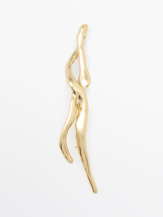 Abstract metal brooch