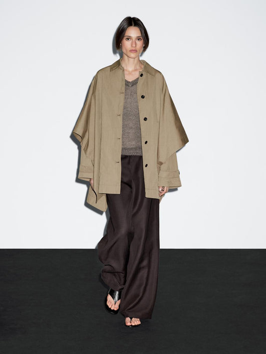 Cape trench coat with long sleeves